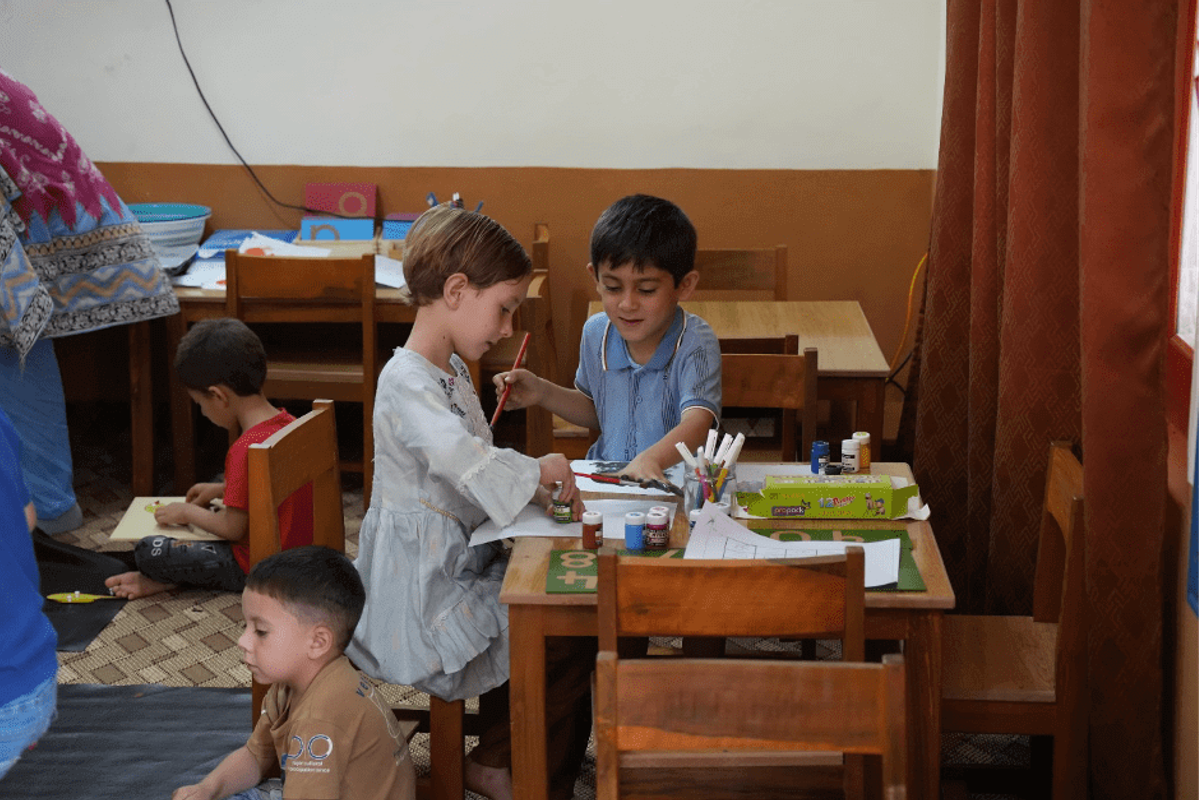 Students at Early Childhood Center Chitral busy at their class work.