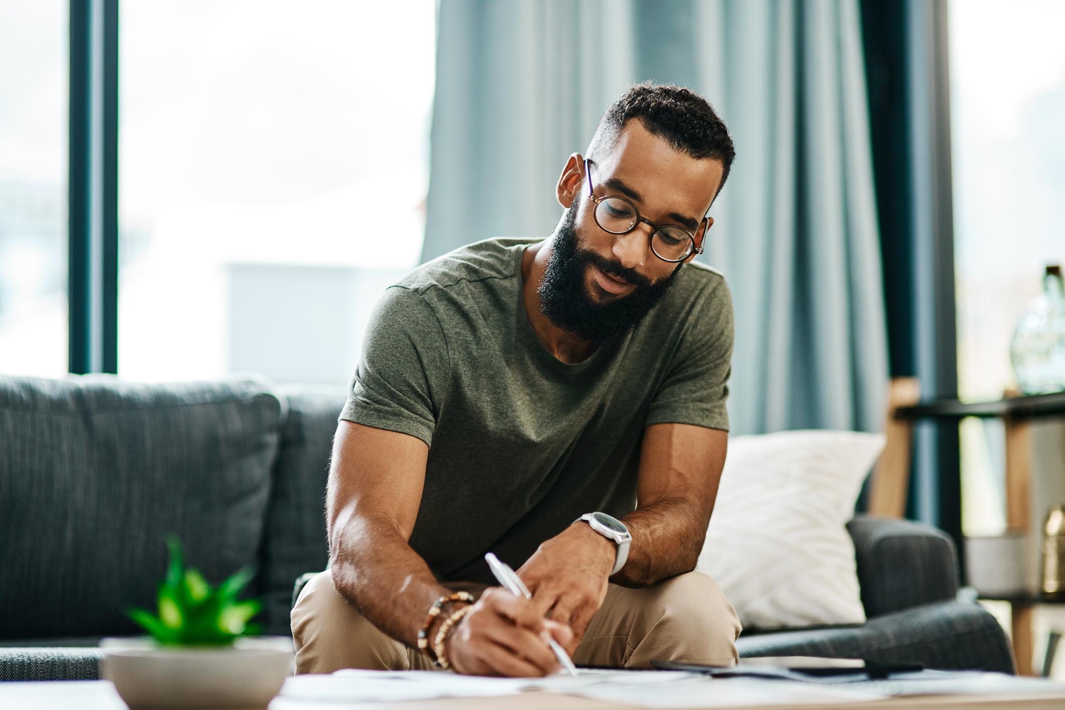 Employee reviewing invoice payment terms to ensure timely payment