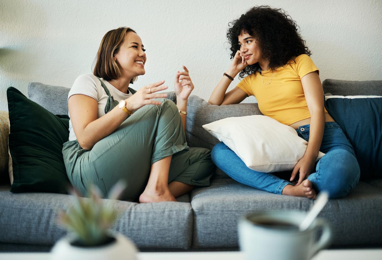 Friends relaxing and chatting on a couch during Ukraine’s public holidays