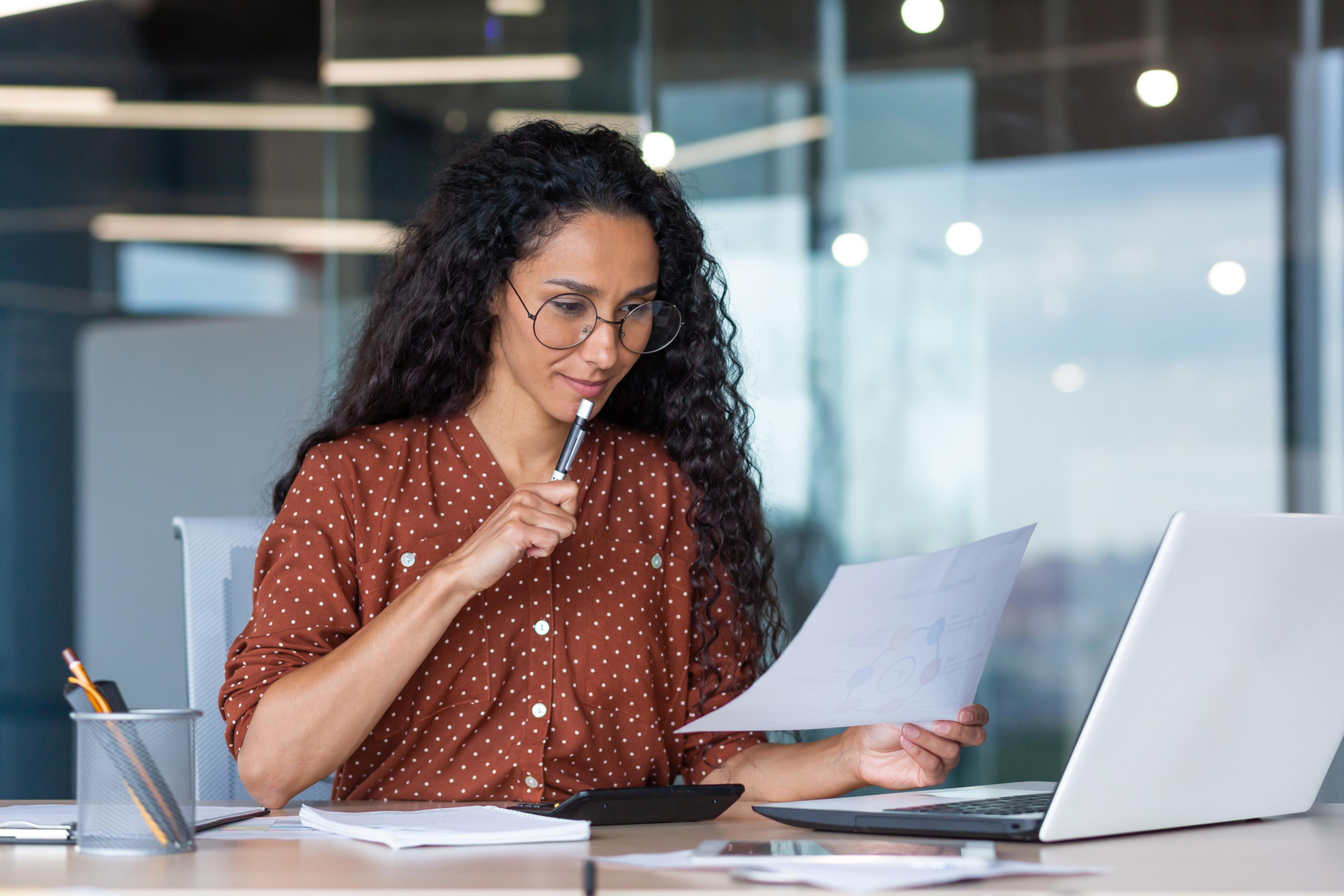 Global HR manager creating an employee handbook for 2026
