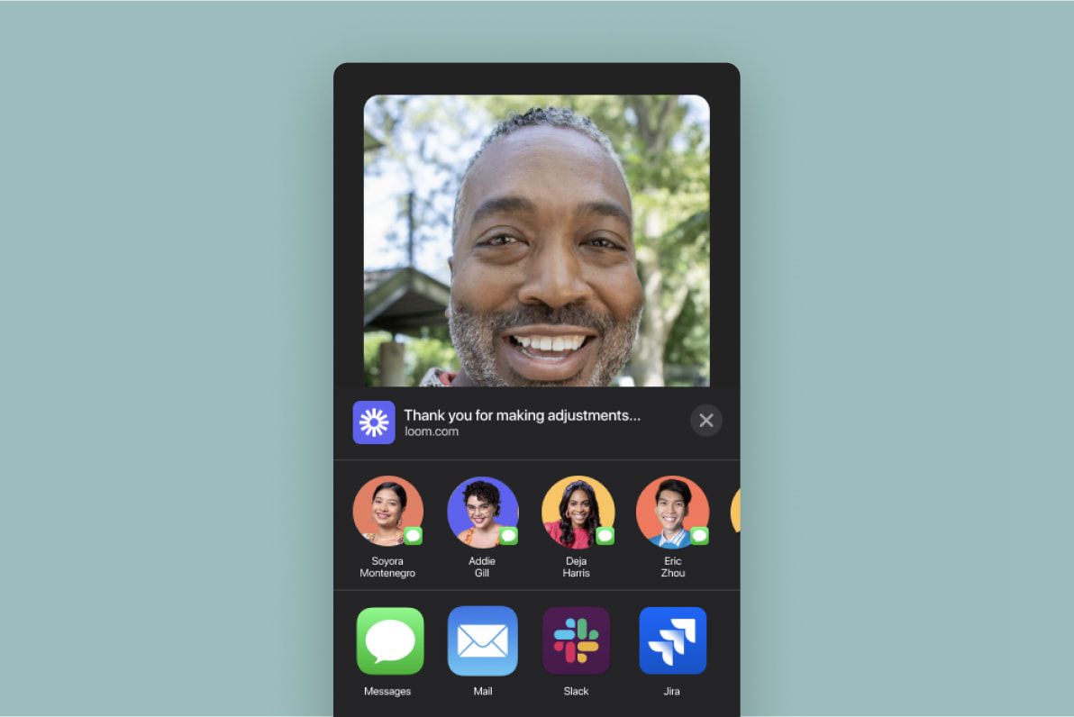Phone screen with Loom video of grey-haired person smiling, with options to share to Messages, Mail, Slack, and Jira