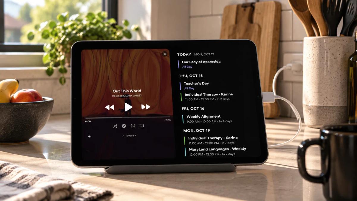 Android tablet displaying Spotify music controls and a calendar schedule in StandBy Mode Pro.