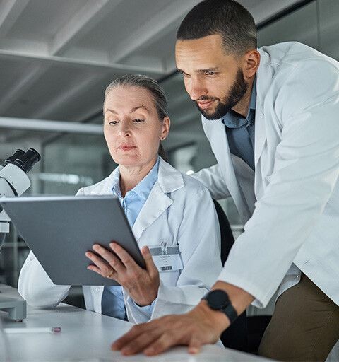 Scientists working together in a lab