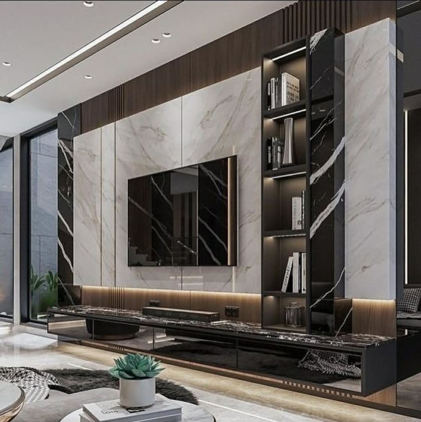 A full-height media wall in book-matched marble and dark timber joinery