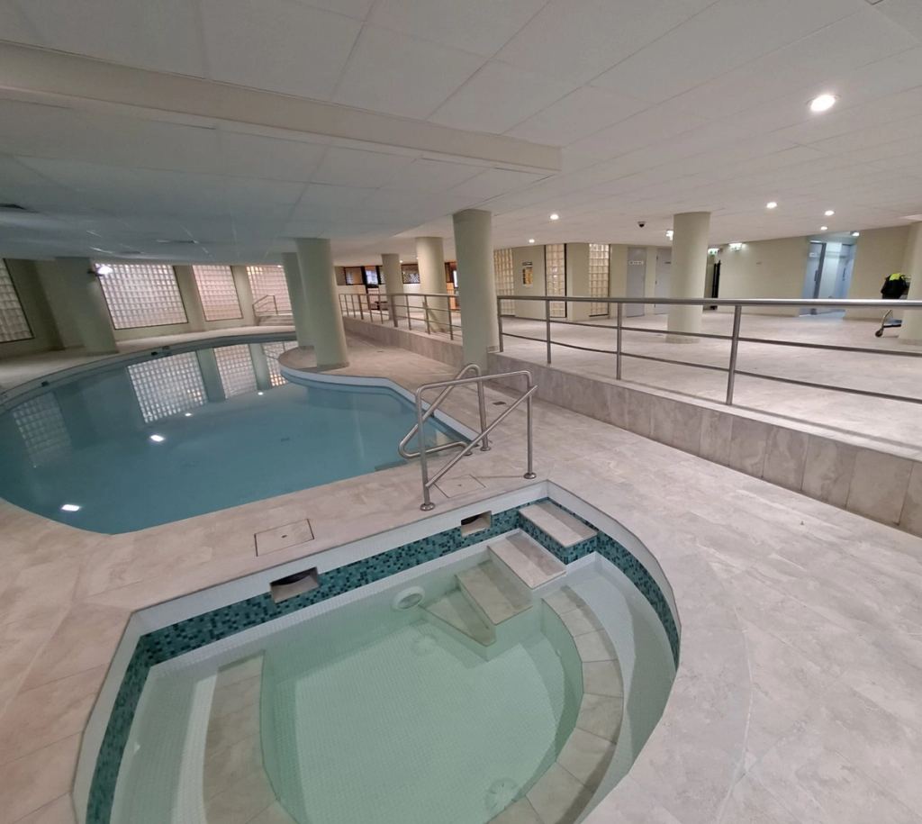 The completed pool and spa at Rockdale Gardens, refinished in pale stone tile