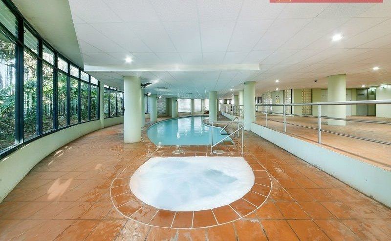 The original indoor pool hall with terracotta tiled surround before works began