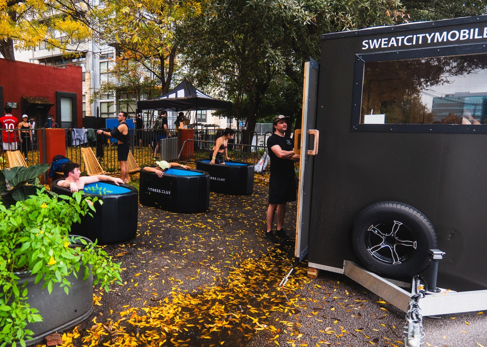 The SweatCity mobile sauna trailer parked at an event