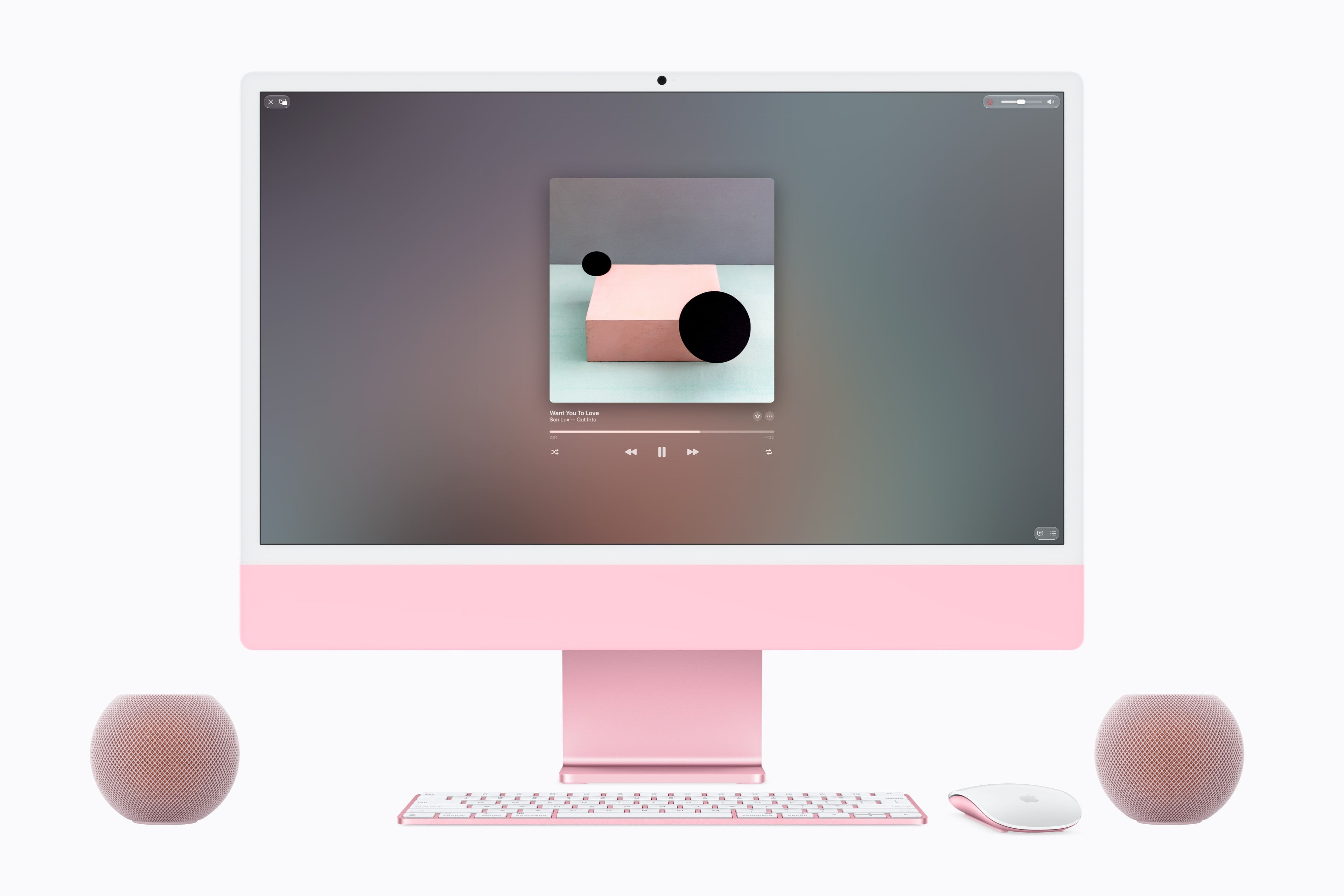 HomePod mini 2 color rosa junto a iMac. - imagen cedida por Apple.