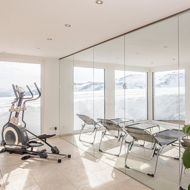 Fitness and relaxation areas with panoramic view over the ski area