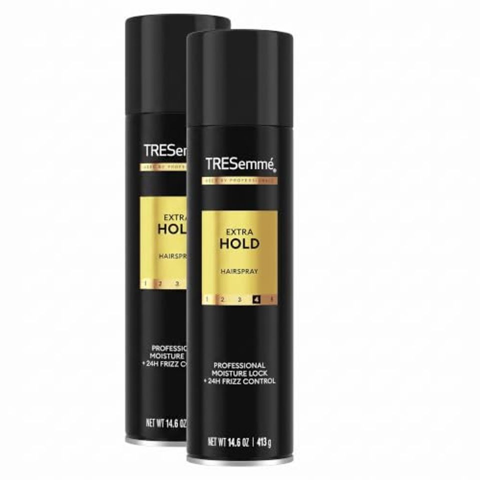 Two black TRESemmé Extra Hold hairspray cans