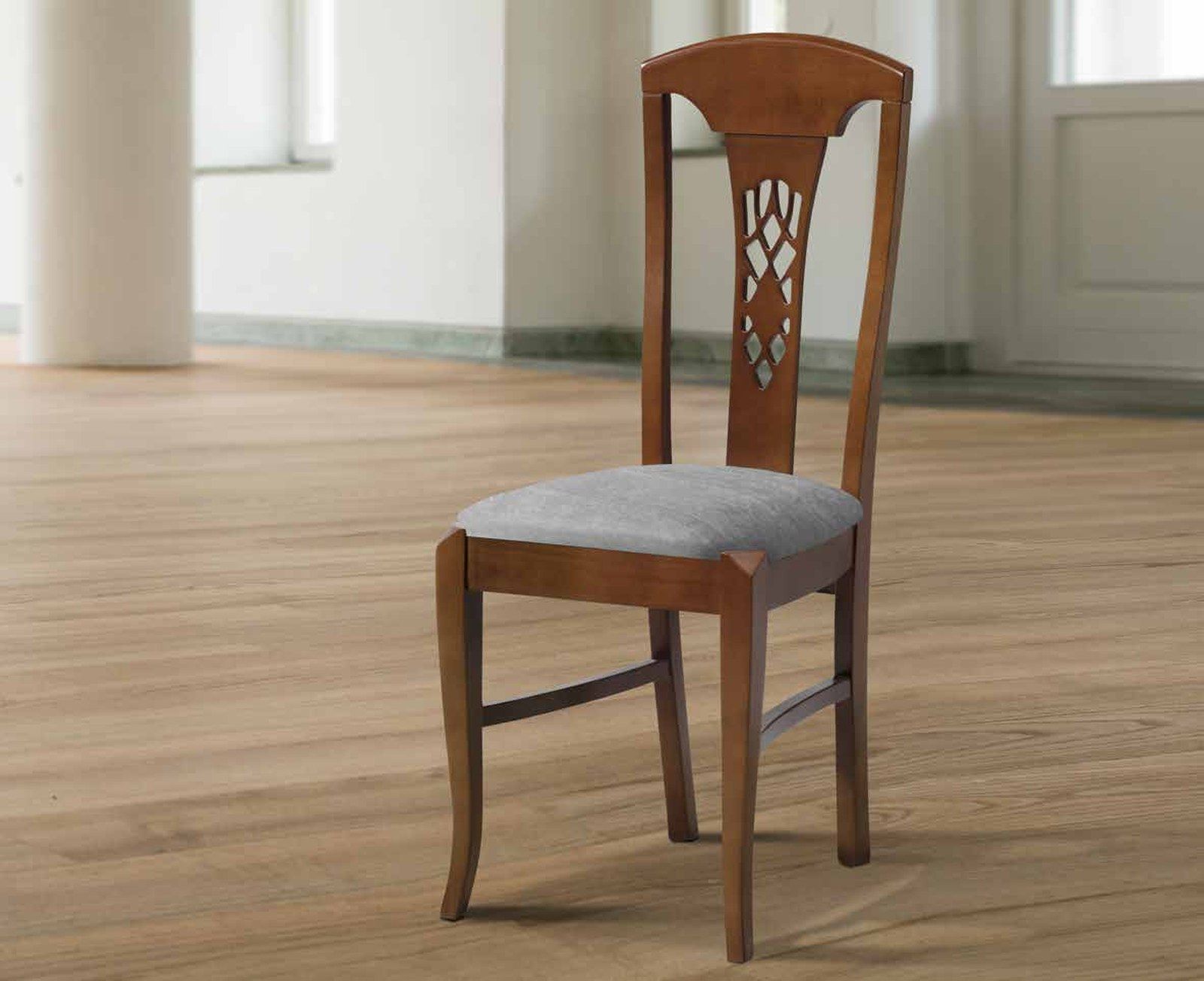 Silla de comedor clásica modelo 24 de SG, respaldo de madera con calado tallado y asiento tapizado
