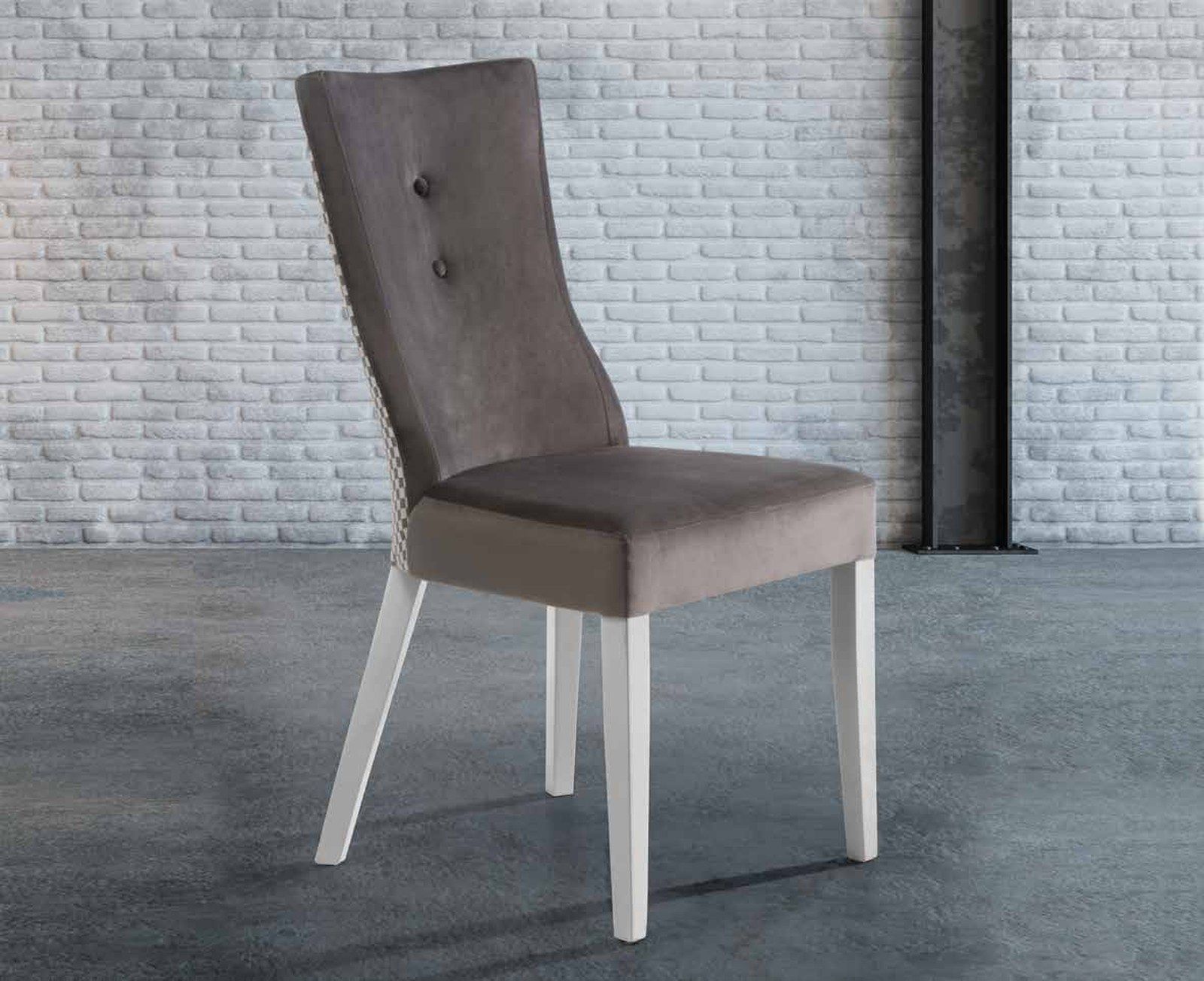 Silla de comedor modelo 160 de SG, respaldo alto tapizado con un botón central y estructura blanca