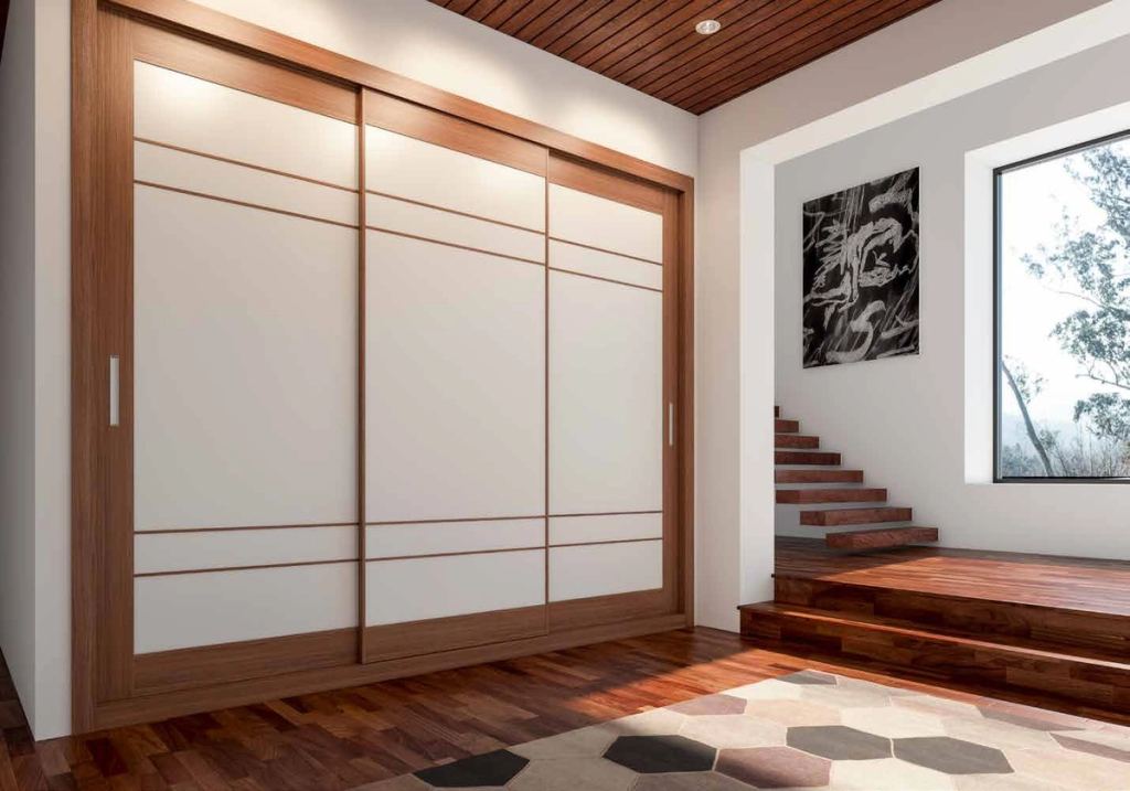 Puertas correderas de armario empotrado en blanco, en un dormitorio, composición tabelle.