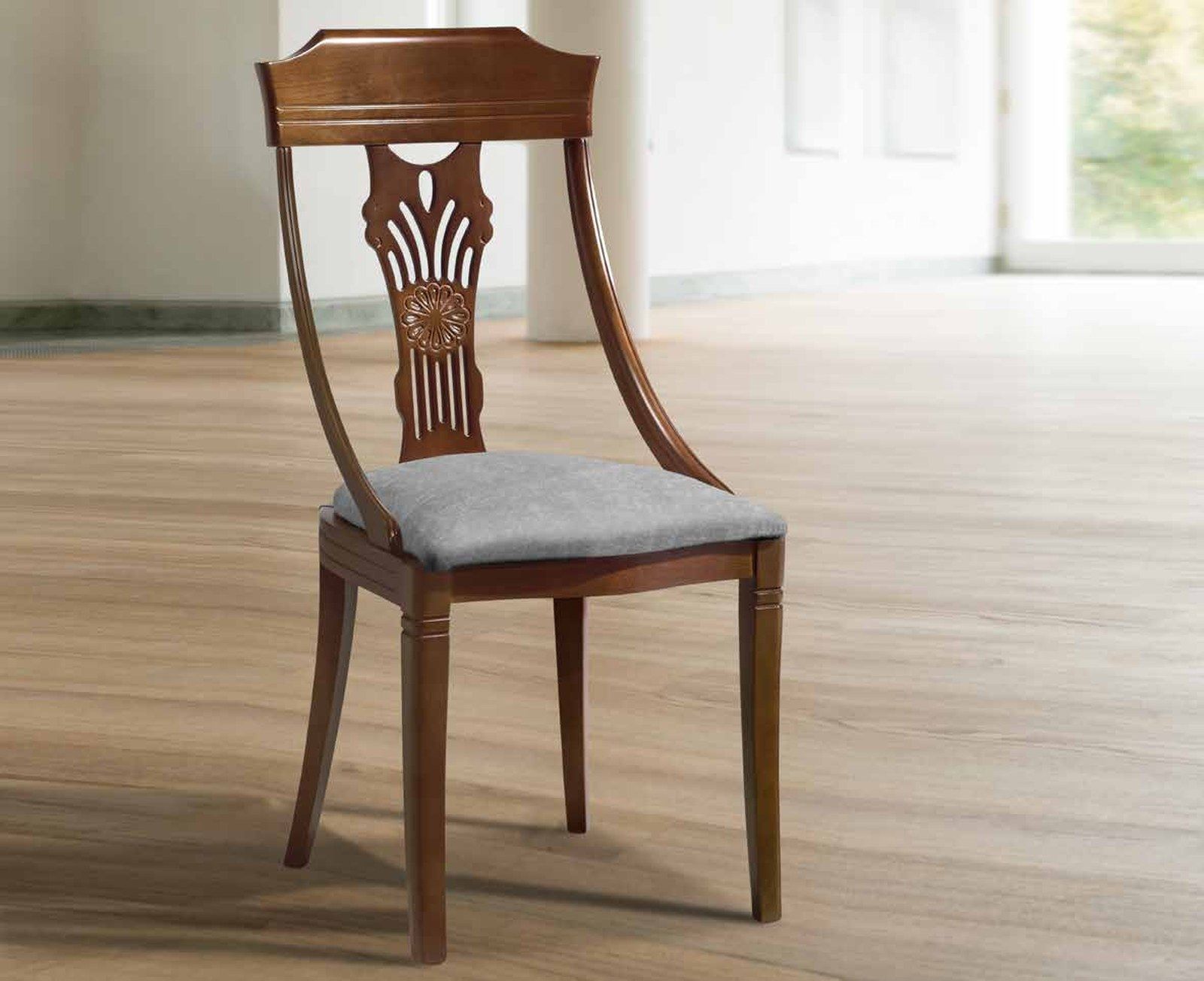 Silla de comedor clásica modelo 59 de SG, respaldo curvado de madera con talla central y asiento tapizado
