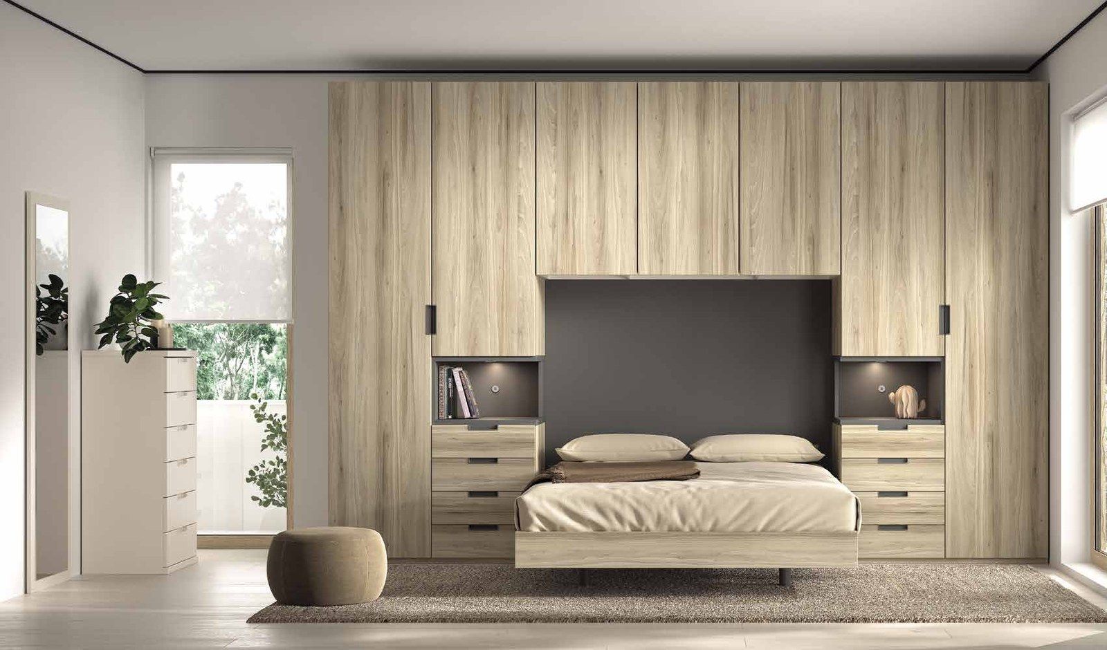 Vista general de la composición F-310, se observan cama integrada en puente de armarios, cajoneras e iluminación con USB.