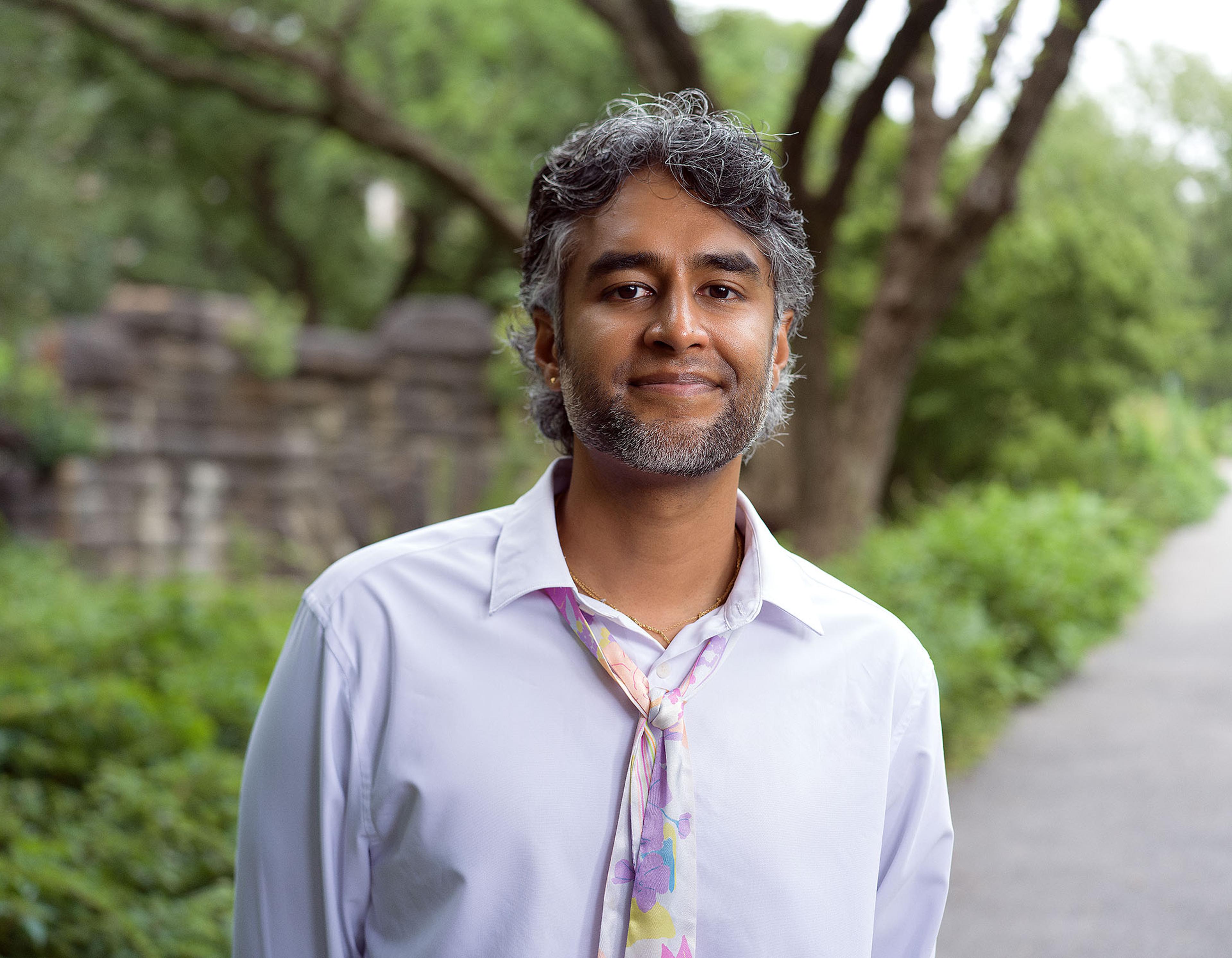 Dr. Kavin Fatehchand, MD-PhD, outdoors in New York.