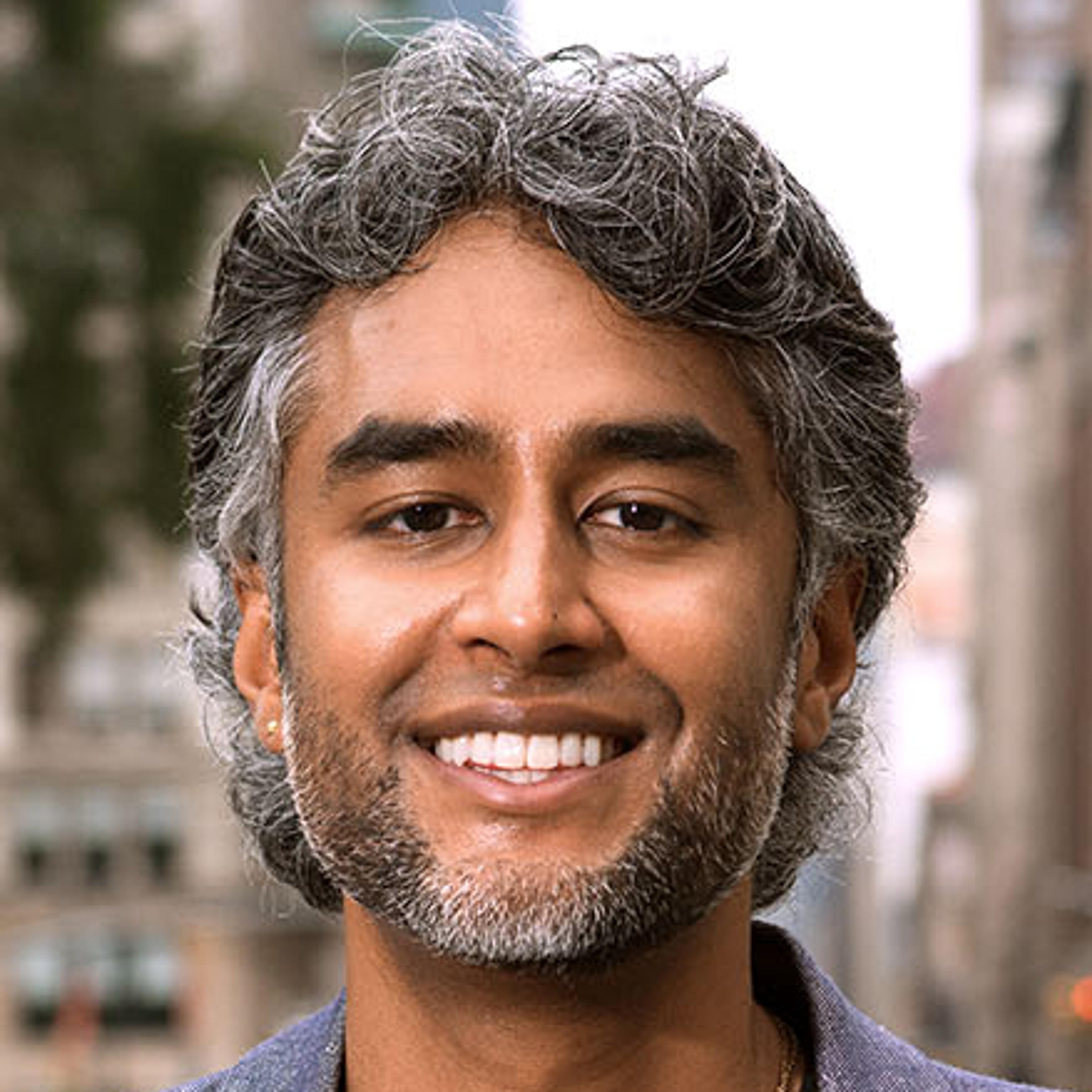 Headshot of a South Asian Man