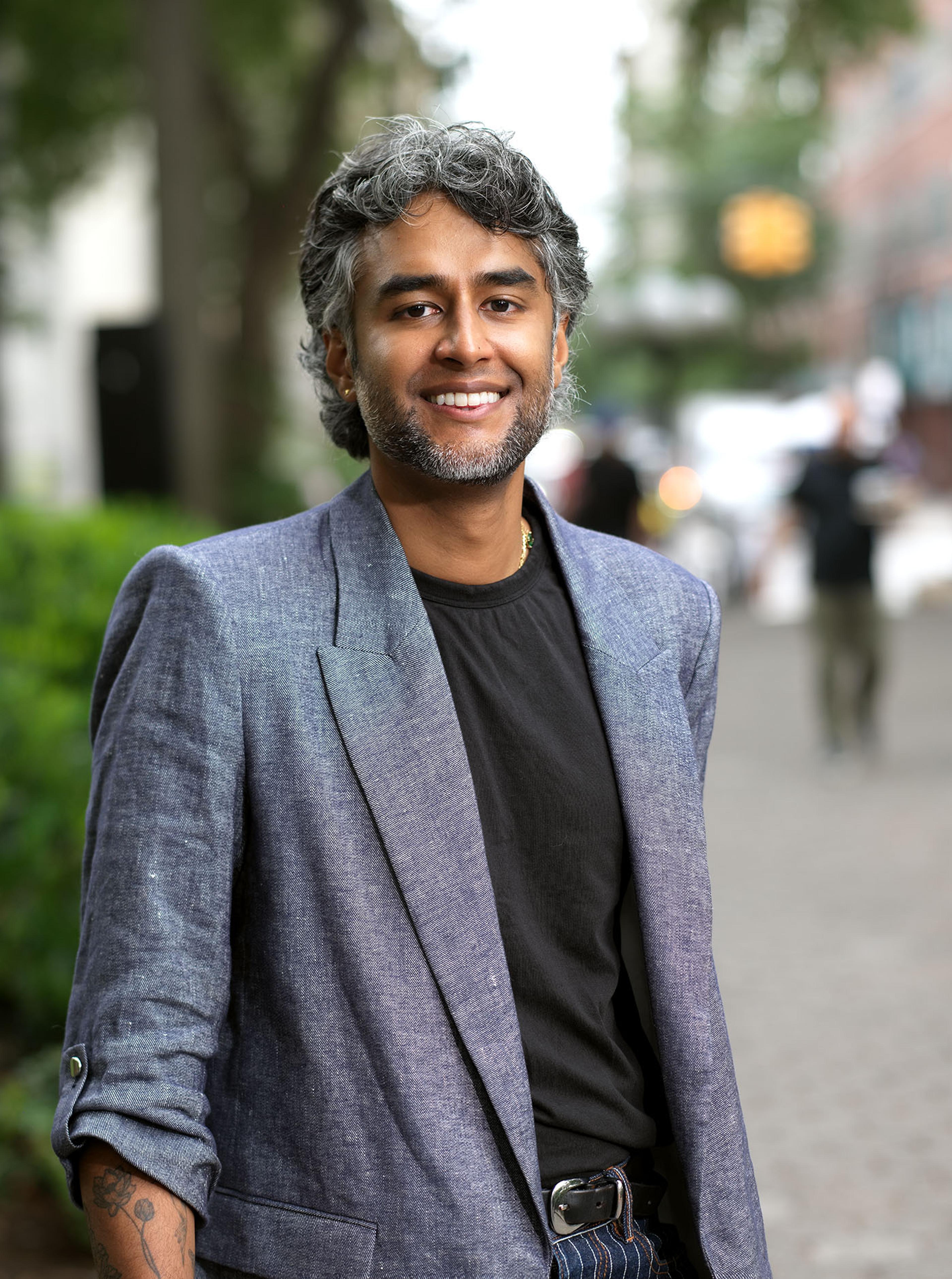 Dr. Kavin Fatehchand, MD-PhD, on a New York City street.