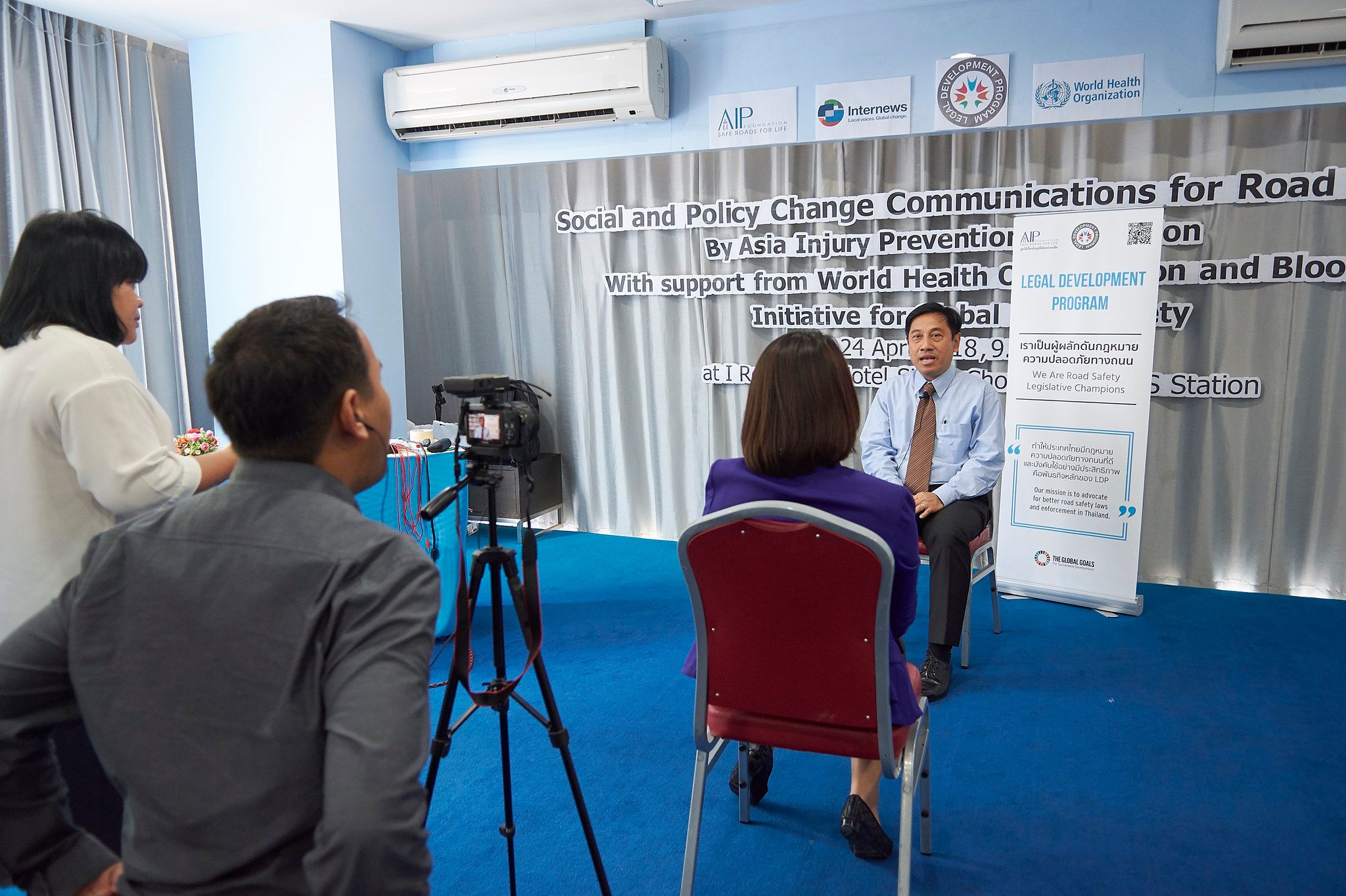 Thai PBS reporter Hathairat Phaholtap leads a mock on camera interview with an LDP member.