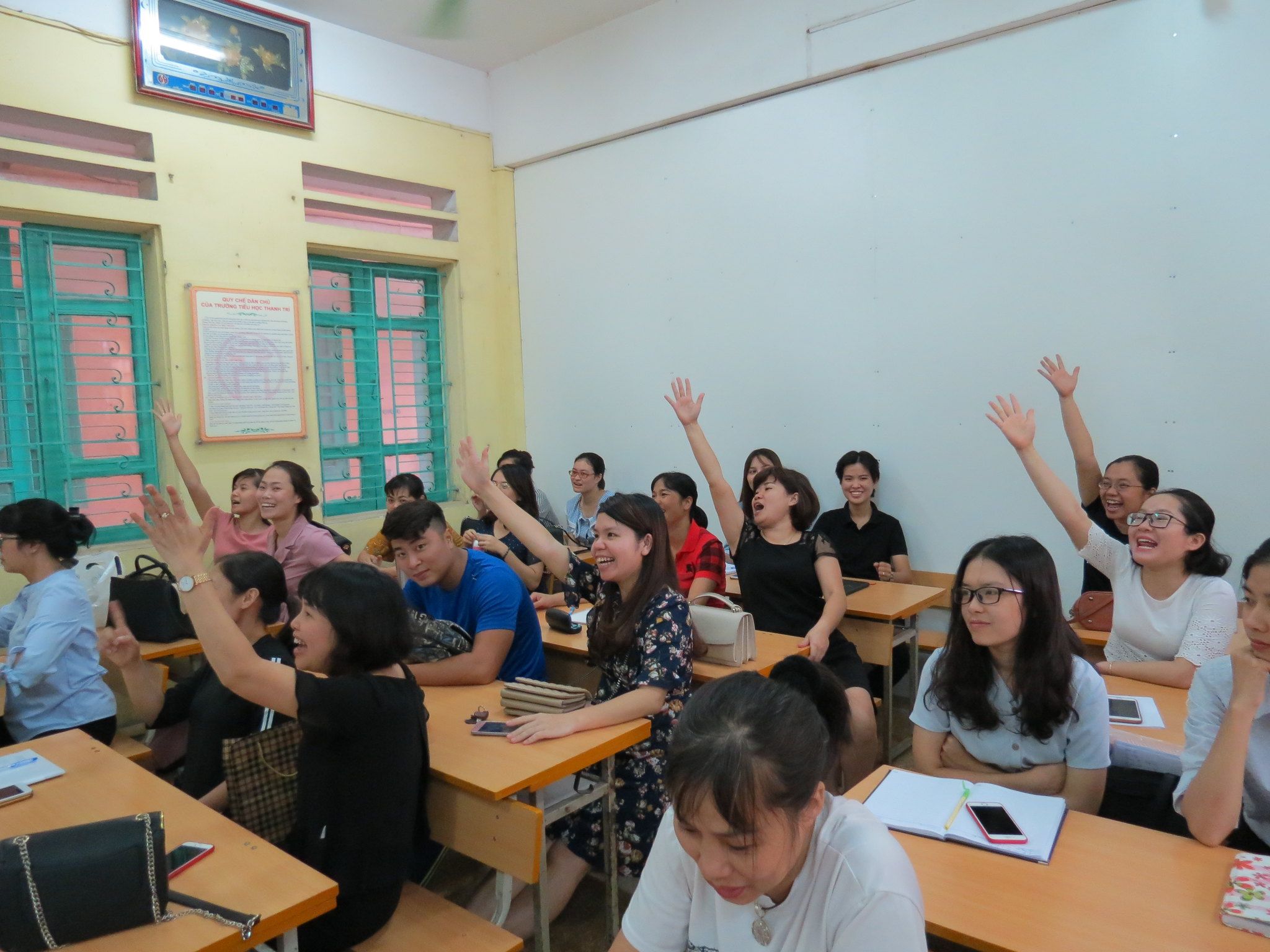 Primary school teachers answer road safety questions at the training