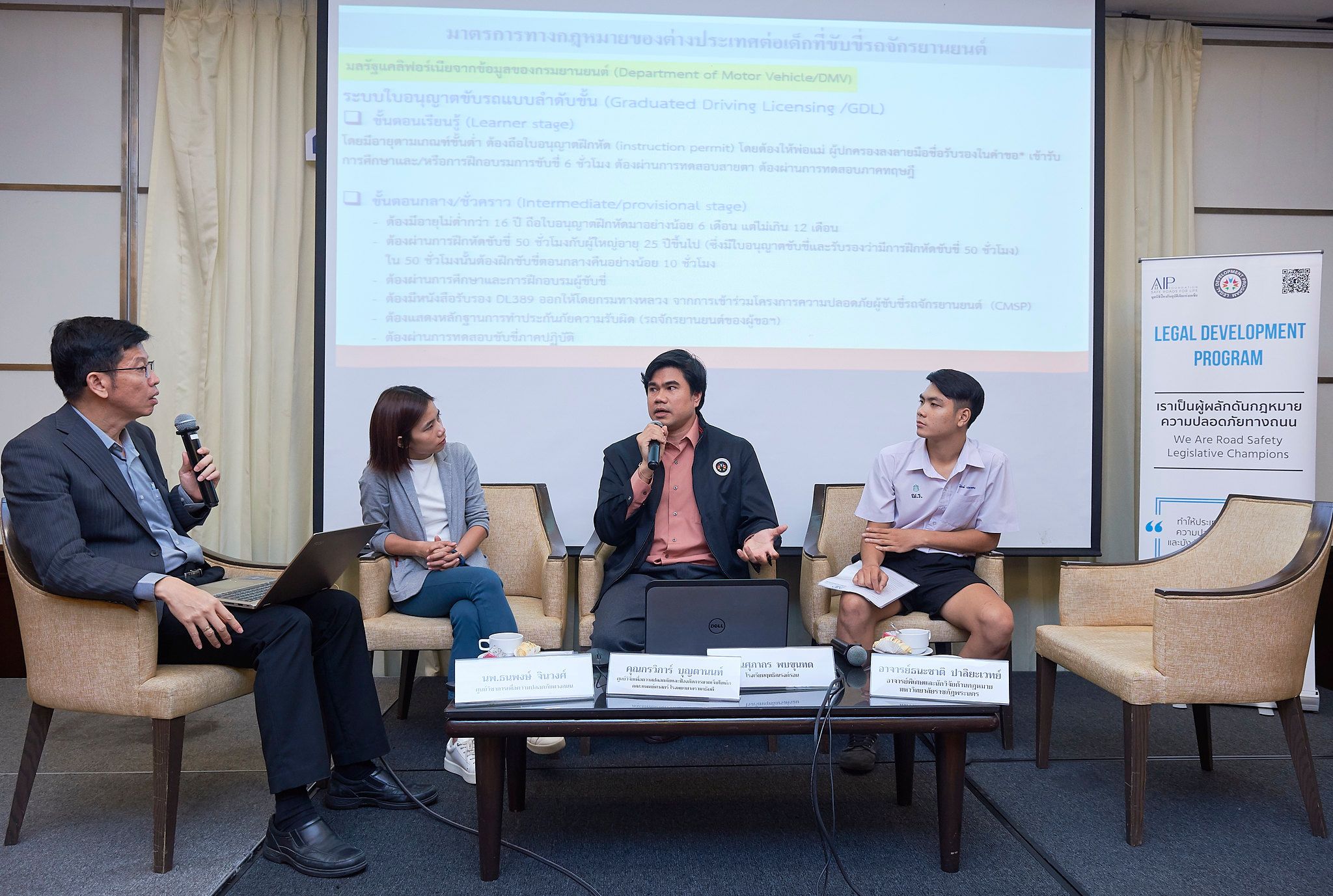 Panelists discussing the safety of young motorcycle riders in Thailand.