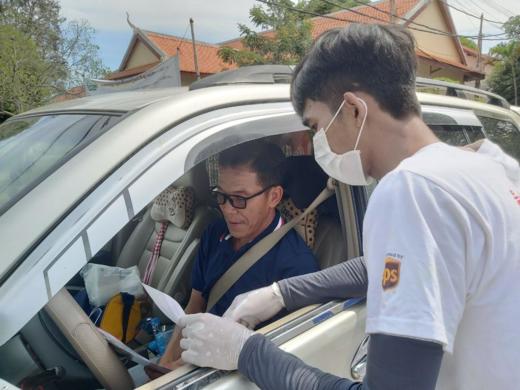 Cambodian University students hit the streets to raise awareness on road safety and COVID-19 prevention