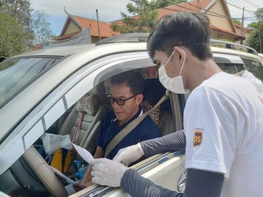 Cambodian University students hit the streets to raise awareness on road safety and COVID-19 prevention