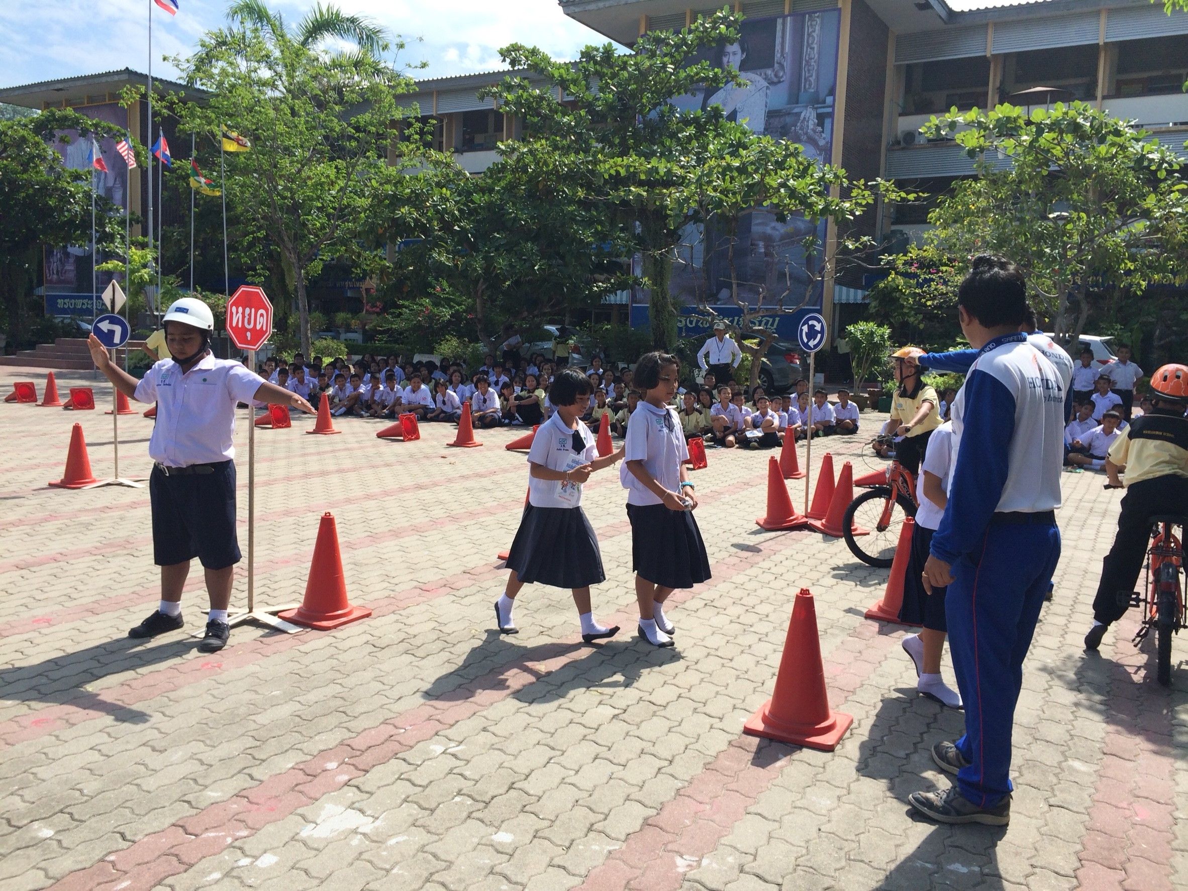 Young students at the Wicheinchom School participate in a road simulation activity as part of the program.