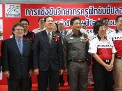 The 10th Contest of the Driving Coach Trainers features a parade of motorcycles in Bangkok