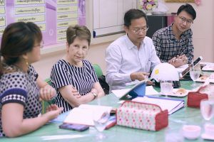 Representatives from AIP Foundation and the Rotary Clubs of Srapatum and Bangkorlaem meet with Wat Rachasingkorn School executives in Bangkok.