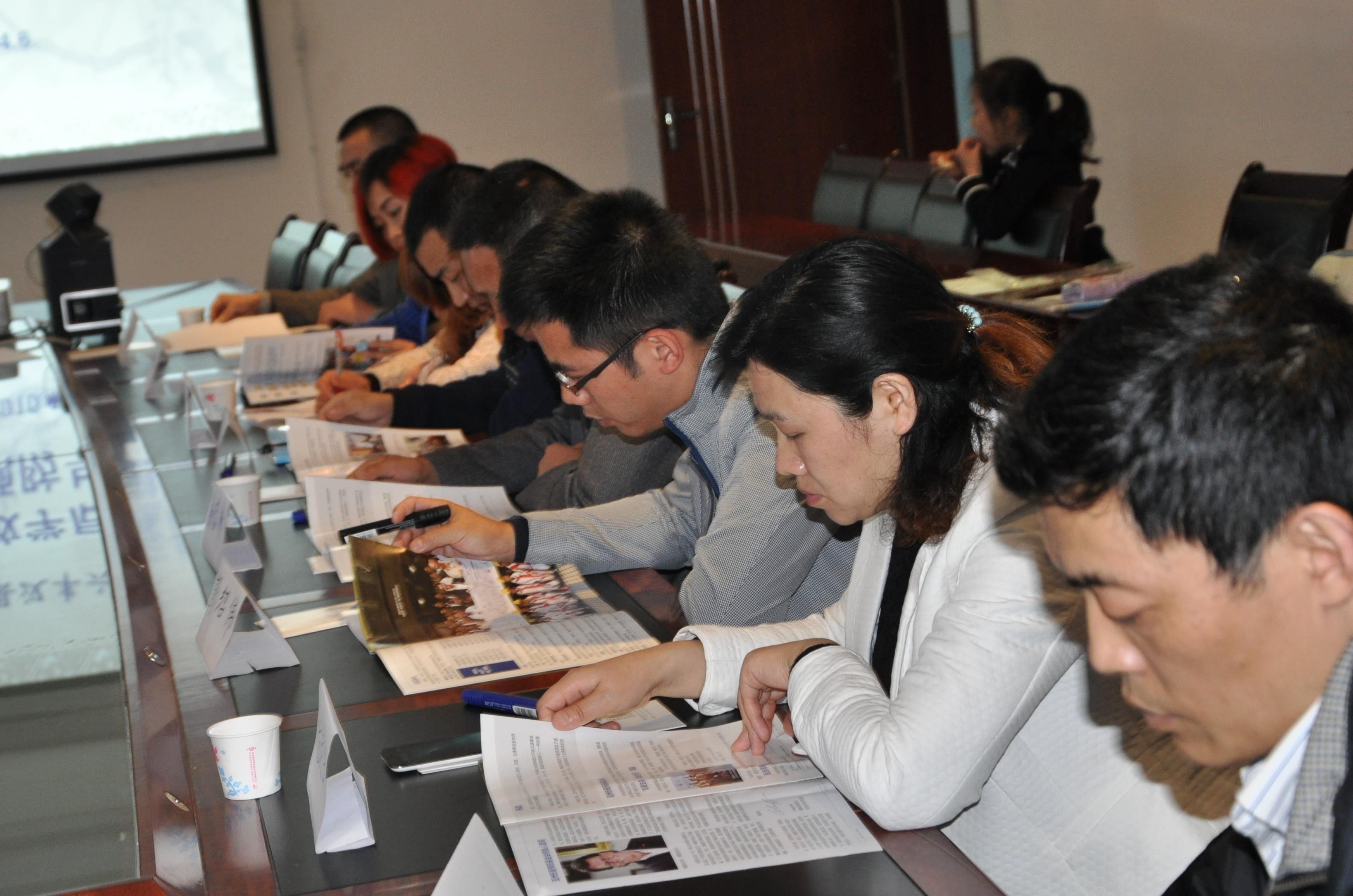 Parents consult road safety materials provided by AIP Foundation staff during the workshop.