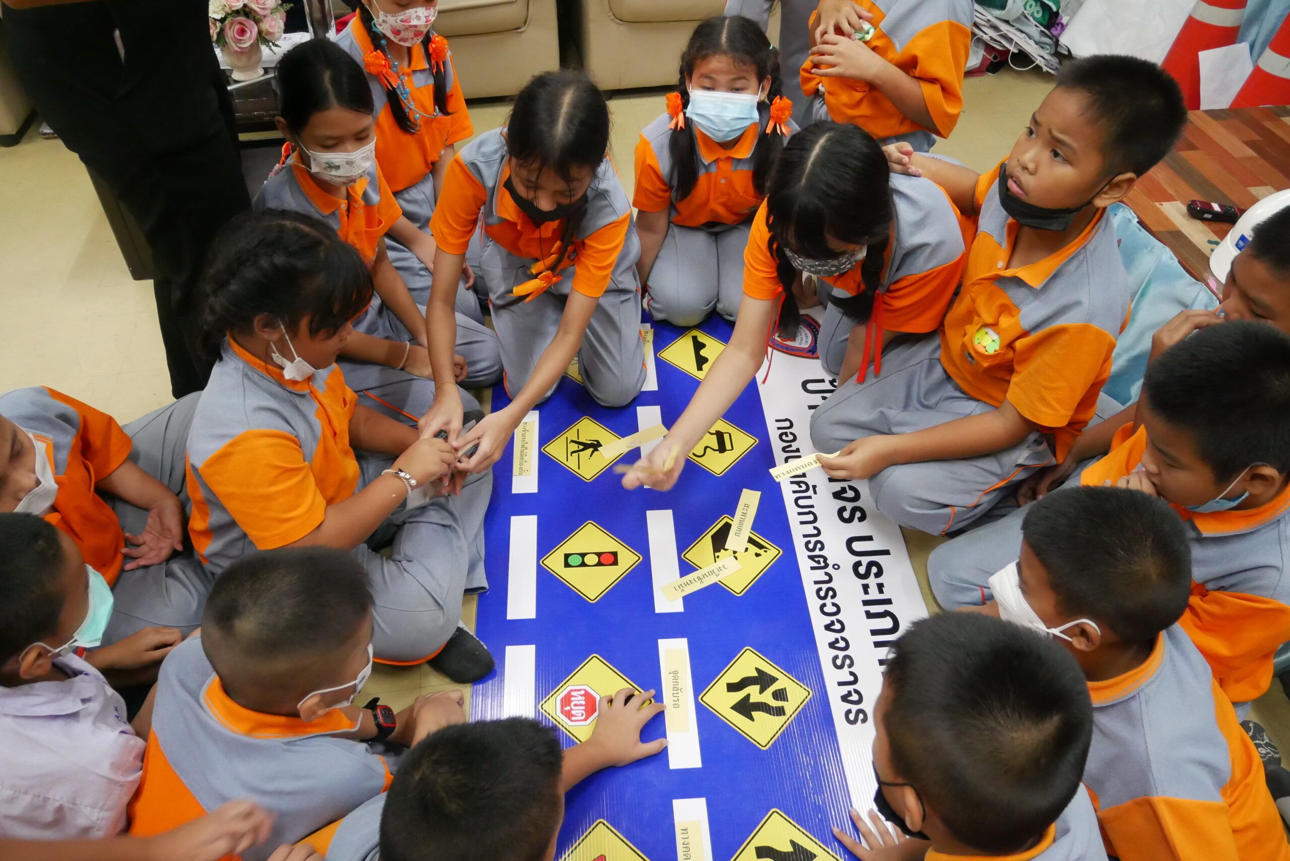 Students and teachers engage in interactive road safety training course learning new skills for a safer future