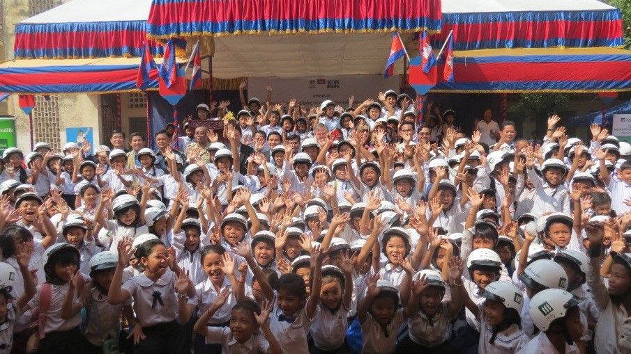 Students are happy to receive helmets and commit to wearing them