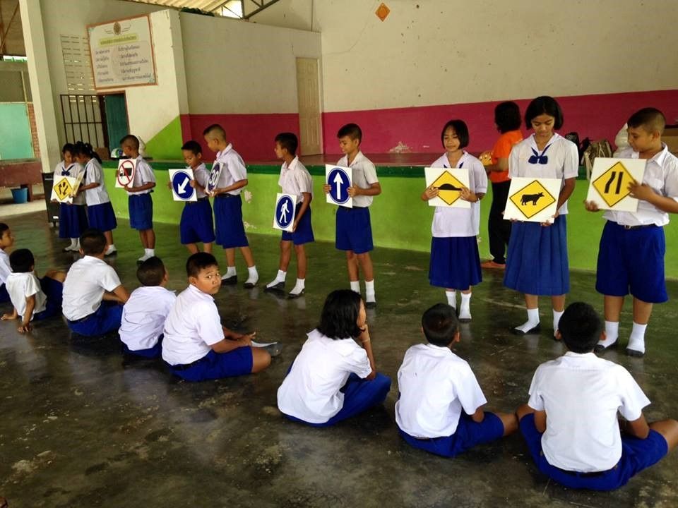 Students learn about traffic signs and how to practice safe behavior on the roads