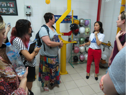 Nguyen Anh Cam, HR Manager of Protec, takes University of Adelaide students on a tour of the Protec factory in Hanoi.