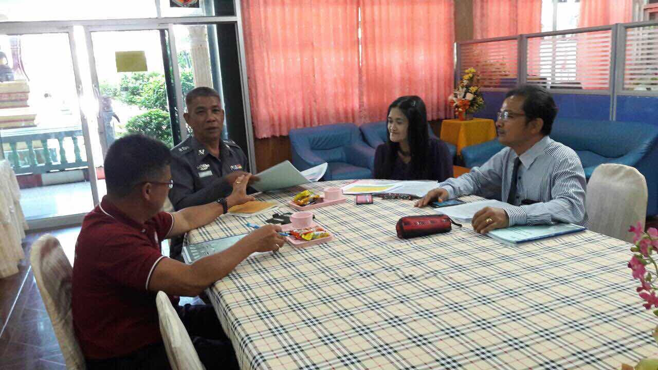 School and police representatives meet to discuss how best to put together a successful event for the Street Wise program.