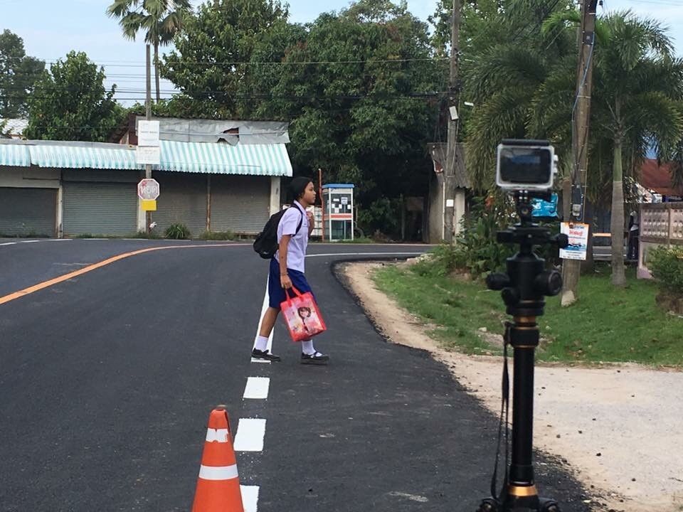 The Street Wise team uses a video camera to collect data on students’ road behaviors during the baseline evaluation for the program’s five new target schools.