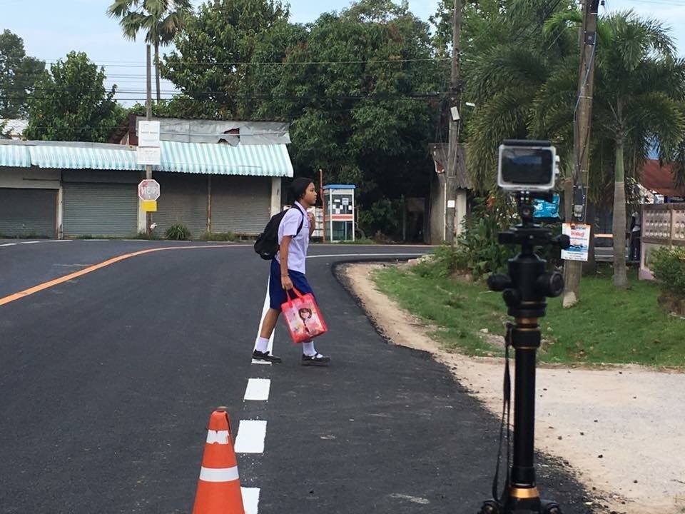 The Street Wise team uses a video camera to collect data on students’ road behaviors during the baseline evaluation for the program’s five new target schools.
