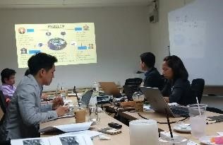 LDP members and AIP Foundation staff discuss suggestions for improving school bus transportation.