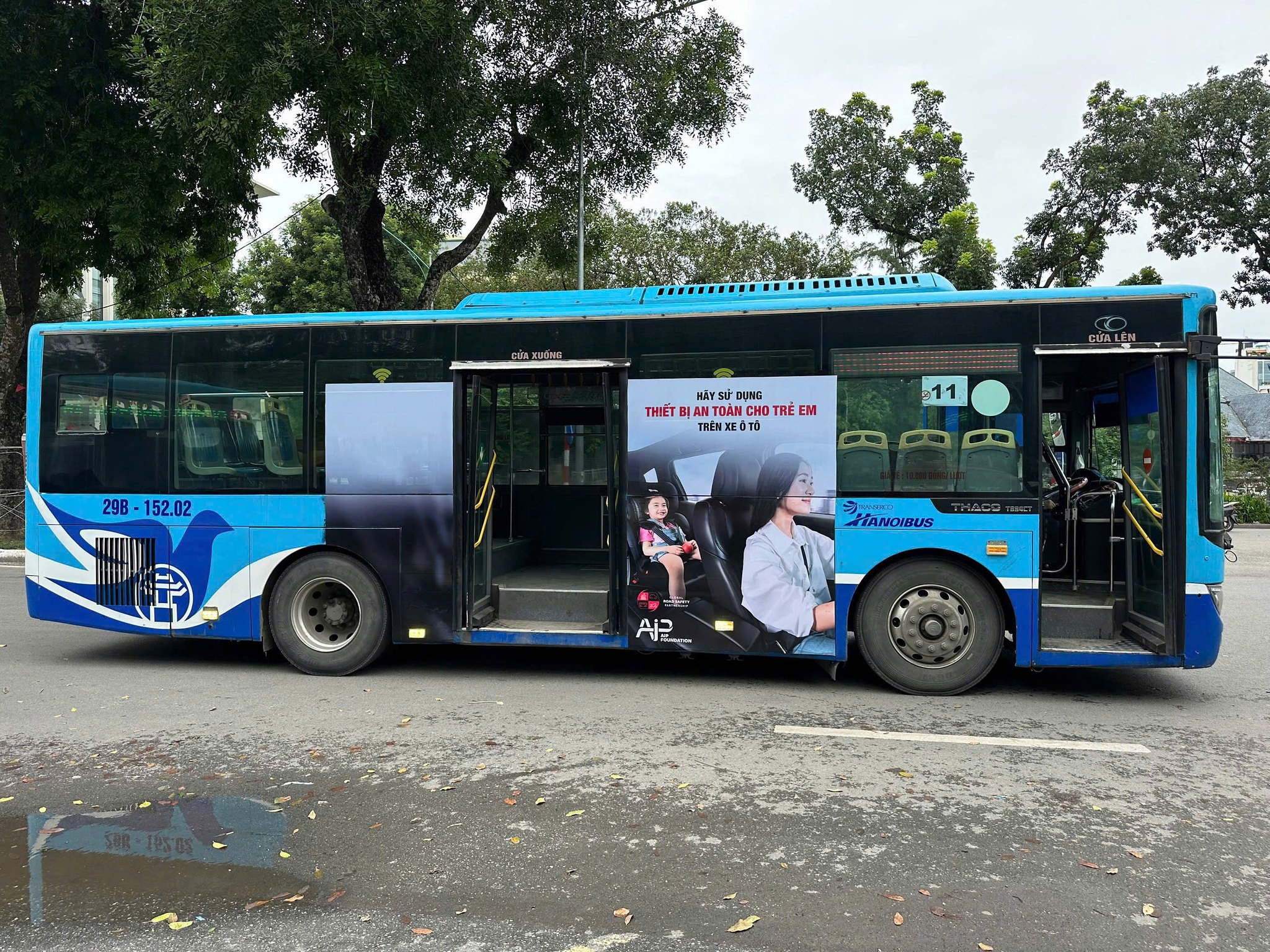 Banner display on bus for CRS awareness campaign in Hanoi