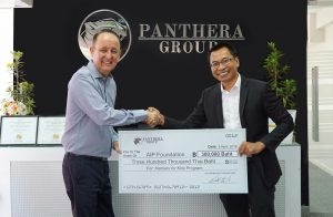 Sawai Seesai, our Thailand Country Manager, accepting the donation from the Panthera Group