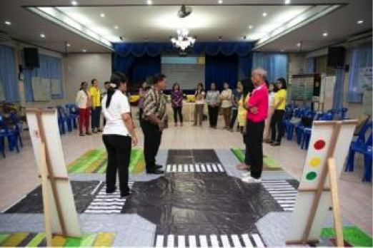 Prospective Street Wise master trainers try their hand at engaging with the education materials of the program.