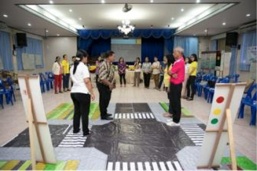 Prospective Street Wise master trainers try their hand at engaging with the education materials of the program.