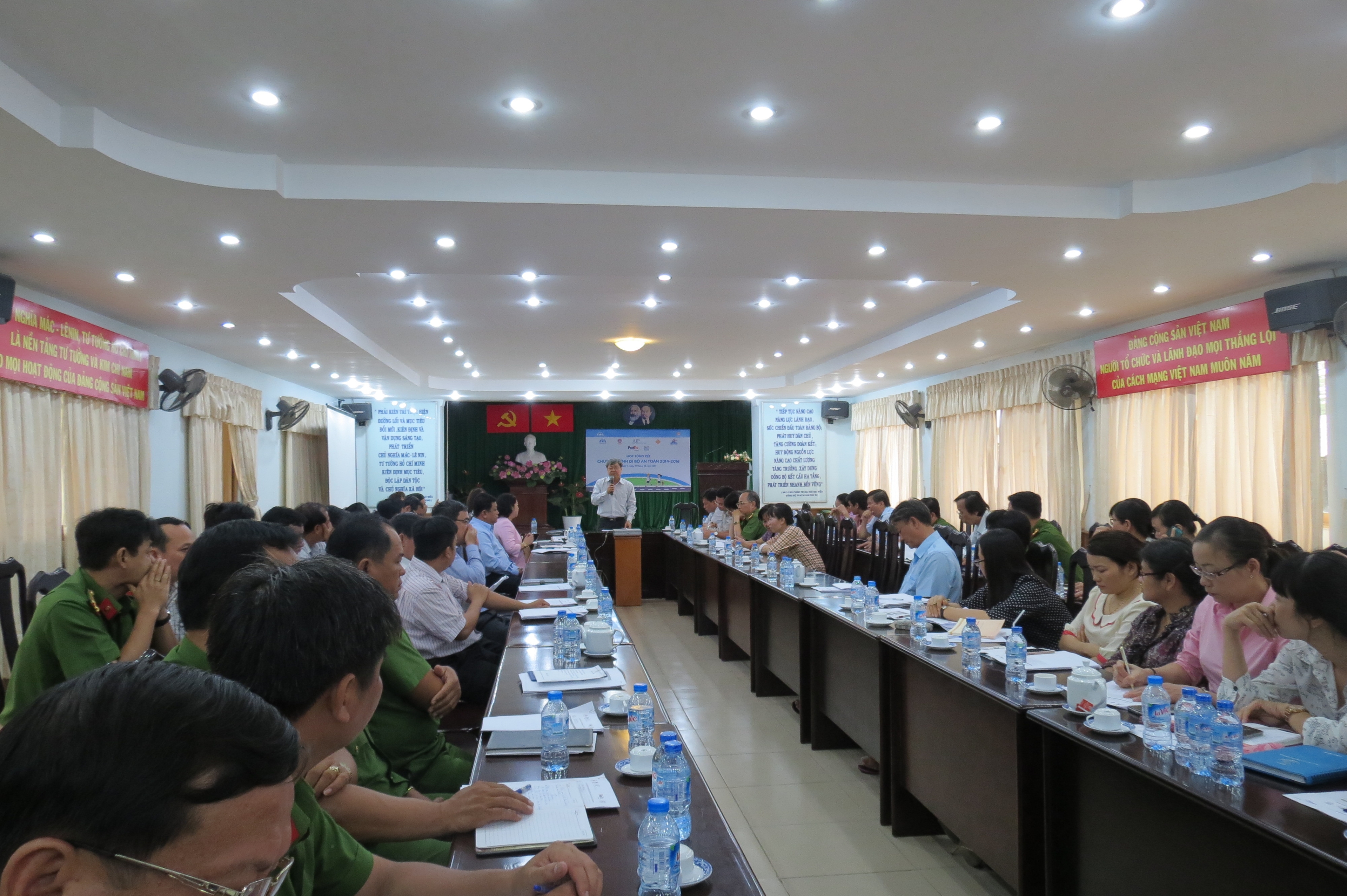 Government officials join AIP Foundation staff, operating as Safe Kids Vietnam, to review the results from the past two years of Walk This Way in District 9 of Ho Chi Minh City.