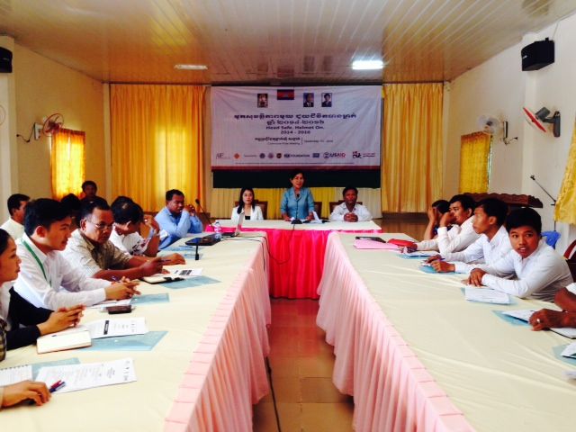 Representatives from target districts including commune council members, commune secretaries, school teachers, commune police, and private sectors meet to discuss project implementation of “Head Safe. Helmet On.”