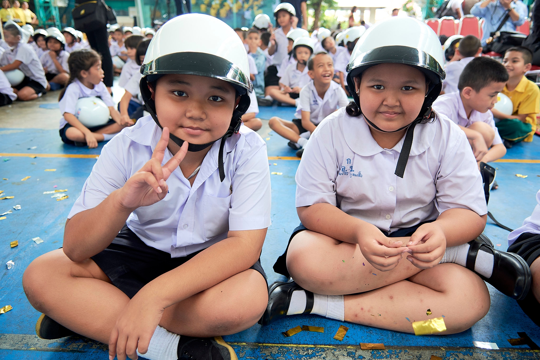 Students at the Safe School, Safe Community kick-off ceremony at Wat Rachasingkorn School.