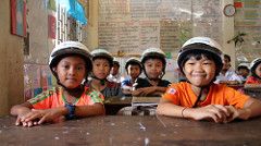 Children participating in the Helmets for Families program in Kampong Cham City