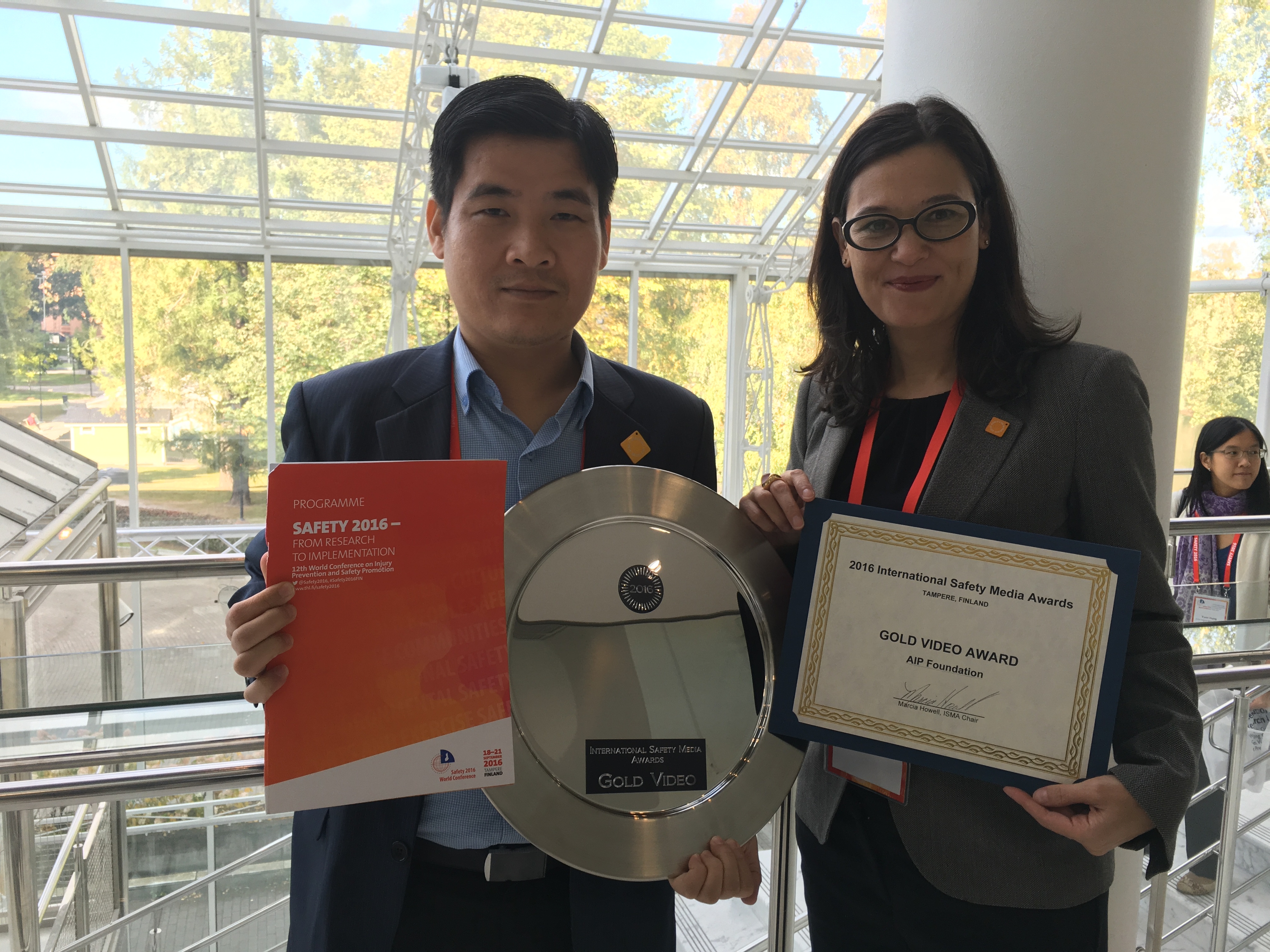 Cambodia Country Director, Pagna Kim (left), and CEO, Mirjam Sidik (right), accepted the awards at the ceremony held at the 12th World Conference on Injury Prevention and Safety Promotion.