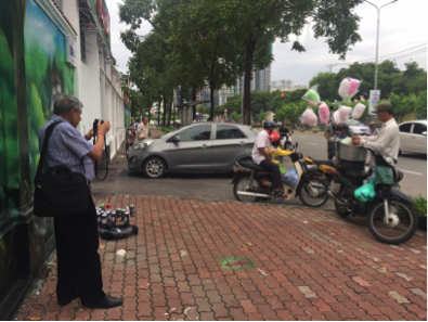 Dr. Rohit Baluja gathers data on traffic patterns in Ho Chi Minh City for his upcoming documentary.