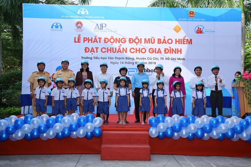 Students from Tan Thanh Dong Primary School receive new quality helmets as part of our Helmets for Families program.